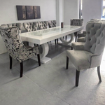 Dining table with 8 upholstered chairs